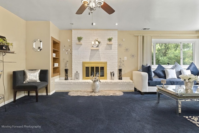 109 Walnut St, Park Forest, IL 60466 - carpeted living area with a ceiling fan, built in shelves, and a brick fireplace