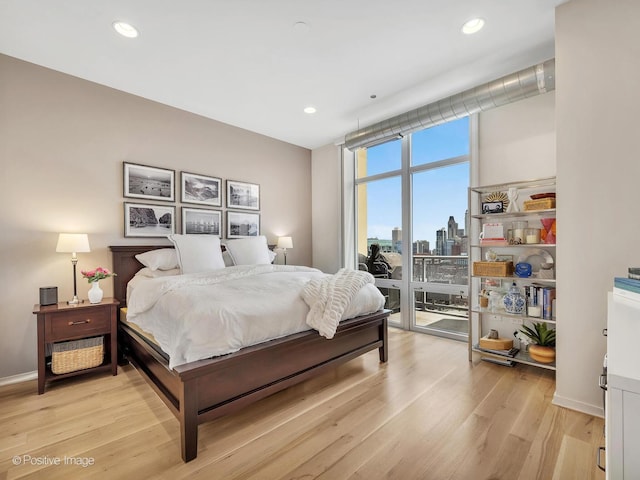 700 N Larrabee St Unit 2008, Chicago, IL 60654 - bedroom featuring access to outside, light wood finished floors, and recessed lighting