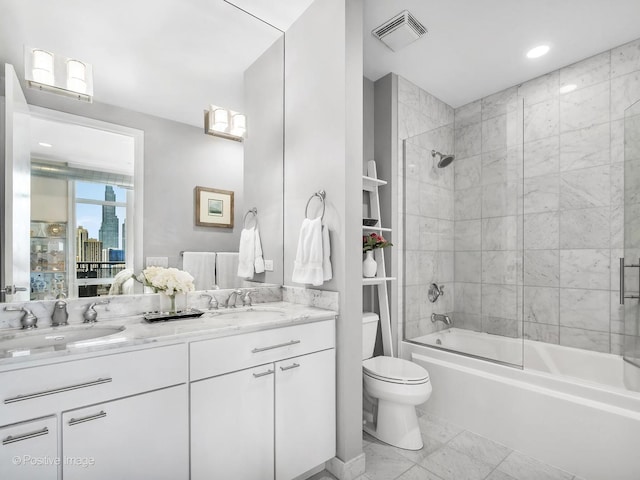 700 N Larrabee St Unit 2008, Chicago, IL 60654 - bathroom featuring double vanity,  shower combination, and recessed lighting