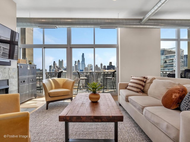 700 N Larrabee St Unit 2008, Chicago, IL 60654 - living area featuring a view of skyline, floor to ceiling windows, and wood finished floors