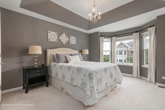 15383 Silver Bell Rd, Orland Park, IL 60462 - carpeted bedroom featuring a raised ceiling and a chandelier