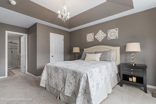 15383 Silver Bell Rd, Orland Park, IL 60462 - carpeted bedroom featuring a chandelier, a tray ceiling, and ensuite bathroom