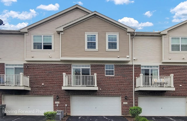 15383 Silver Bell Rd, Orland Park, IL 60462 - back of house featuring brick siding and a garage
