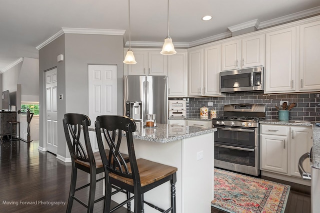 15383 Silver Bell Rd, Orland Park, IL 60462 - kitchen with stainless steel appliances, ornamental molding, dark wood-type flooring, backsplash, and white cabinetry