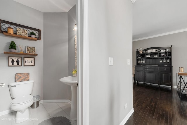 15383 Silver Bell Rd, Orland Park, IL 60462 - bathroom featuring crown molding and wood-type flooring