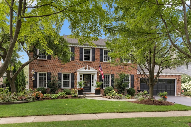 1563 Abbotsford Dr, Naperville, IL 60563 - view of front of home with brick siding, driveway, a front lawn, and a garage