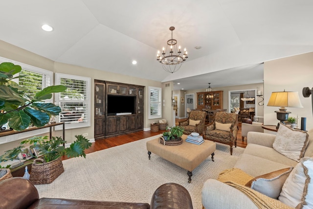 1563 Abbotsford Dr, Naperville, IL 60563 - living room featuring a chandelier, lofted ceiling, wood finished floors, and recessed lighting