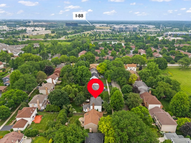 1563 Abbotsford Dr, Naperville, IL 60563 - aerial view of residential area featuring a tree filled landscape