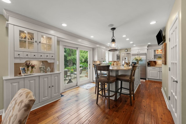 1563 Abbotsford Dr, Naperville, IL 60563 - dining room with dark wood-style floors, recessed lighting, and ornamental molding