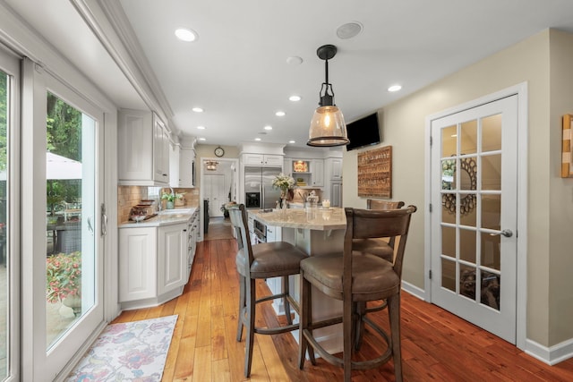 1563 Abbotsford Dr, Naperville, IL 60563 - dining room with light wood-style floors and recessed lighting