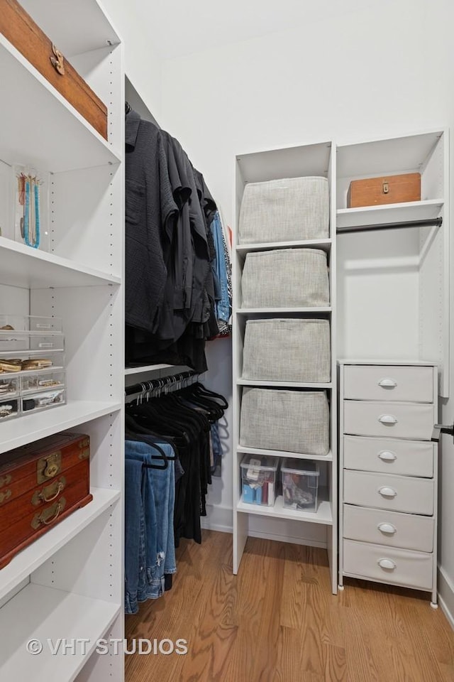 4321 N Paulina St Unit 2N, Chicago, IL 60613 - walk in closet featuring wood finished floors