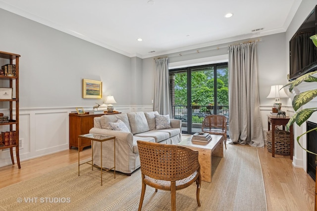 4321 N Paulina St Unit 2N, Chicago, IL 60613 - living room with light wood finished floors, a wainscoted wall, crown molding, and recessed lighting
