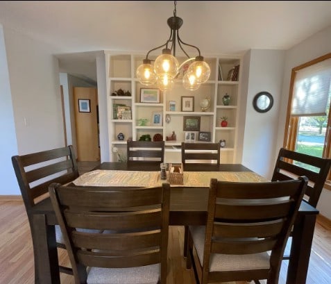 2 Spinnaker Ct, Third Lake, IL 60030 - dining room with wood finished floors and a chandelier