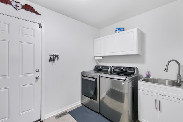 21222 Vivienne Dr, Matteson, IL 60443 - laundry area with cabinet space, independent washer and dryer, and light tile patterned flooring