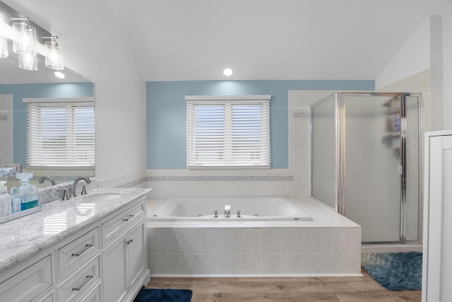 21222 Vivienne Dr, Matteson, IL 60443 - full bath with lofted ceiling, vanity, a bath, wood finished floors, and a stall shower
