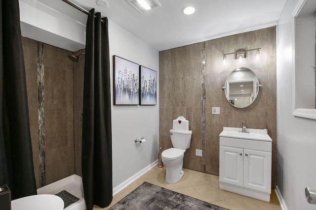 21222 Vivienne Dr, Matteson, IL 60443 - bathroom with tile patterned floors, a shower stall, vanity, and tile walls