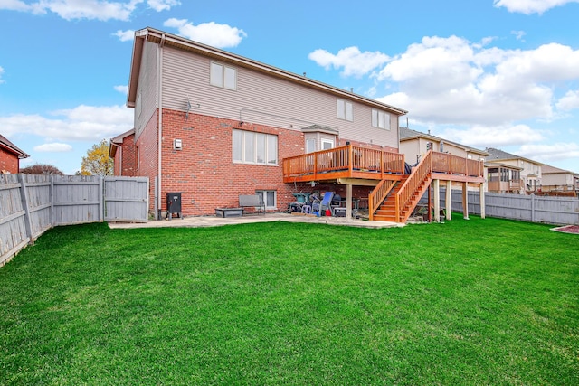 21222 Vivienne Dr, Matteson, IL 60443 - back of house with a wooden deck, a patio area, brick siding, and a fenced backyard