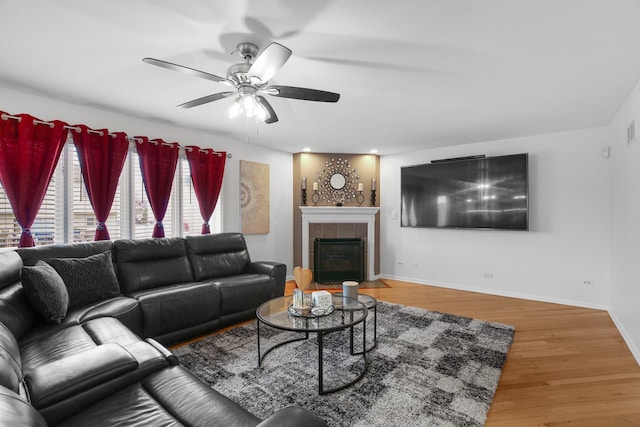 21222 Vivienne Dr, Matteson, IL 60443 - living area with ceiling fan, wood finished floors, and a fireplace