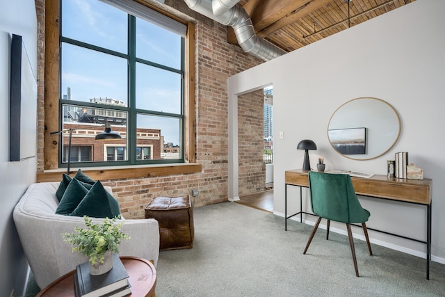 1801 S Michigan Ave Unit 507, Chicago, IL 60616 - carpeted office with brick wall, a wooden ceiling with exposed beams, and a city view
