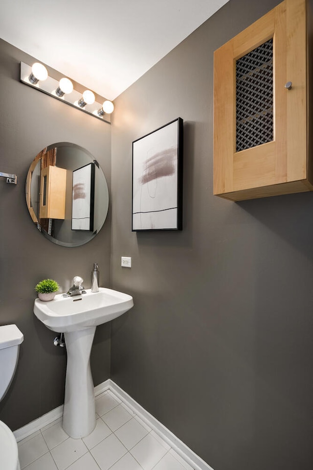1801 S Michigan Ave Unit 507, Chicago, IL 60616 - bathroom with toilet and tile patterned flooring