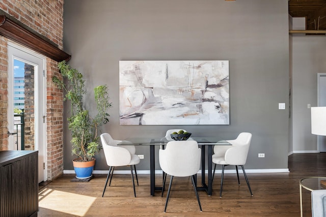 1801 S Michigan Ave Unit 507, Chicago, IL 60616 - dining space with wood finished floors and brick wall