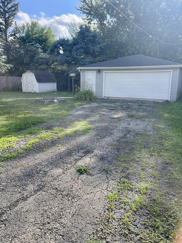 1350 N Elmwood Dr, Aurora, IL 60506 - view of yard with a garage and a storage unit