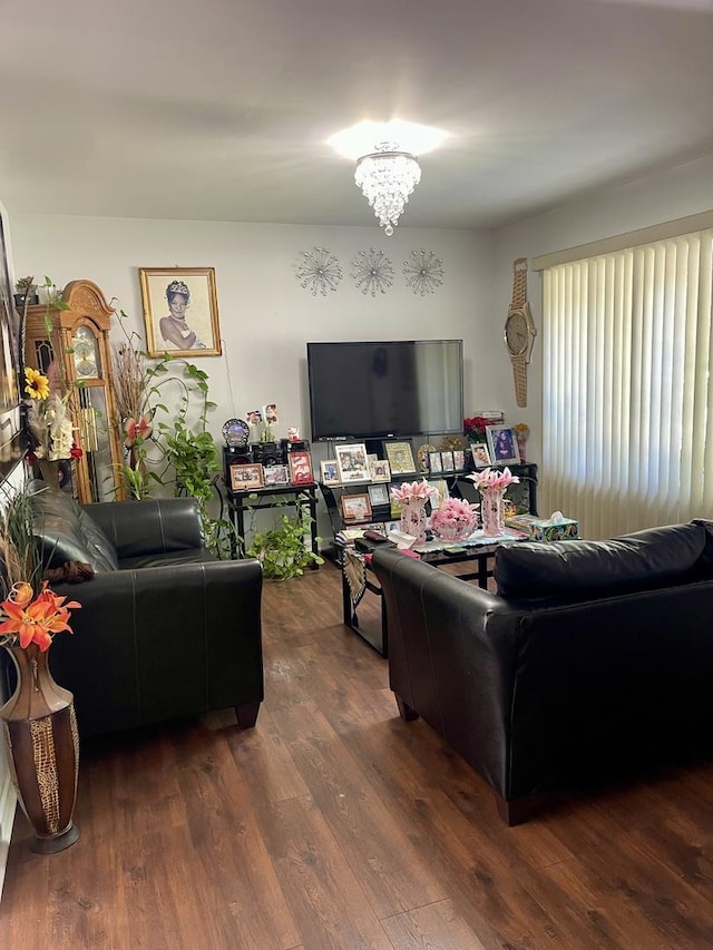 1350 N Elmwood Dr, Aurora, IL 60506 - living area with dark wood-style floors and a chandelier