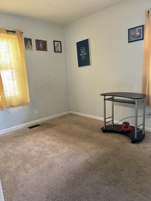 1350 N Elmwood Dr, Aurora, IL 60506 - carpeted spare room featuring baseboards