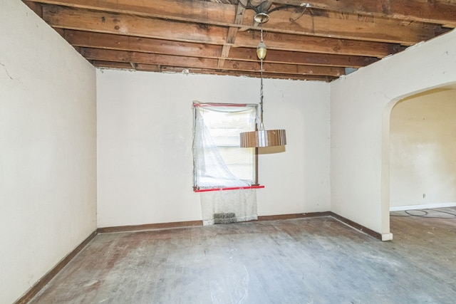 907 W Beardsley Ave, Champaign, IL 61821 - spare room featuring arched walkways and wood finished floors