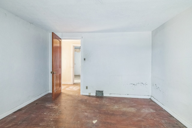 907 W Beardsley Ave, Champaign, IL 61821 - spare room with baseboards and wood finished floors