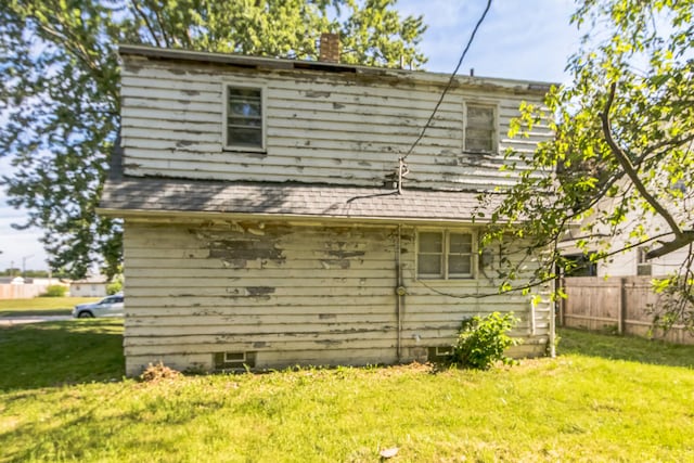 907 W Beardsley Ave, Champaign, IL 61821 - rear view of property featuring a chimney