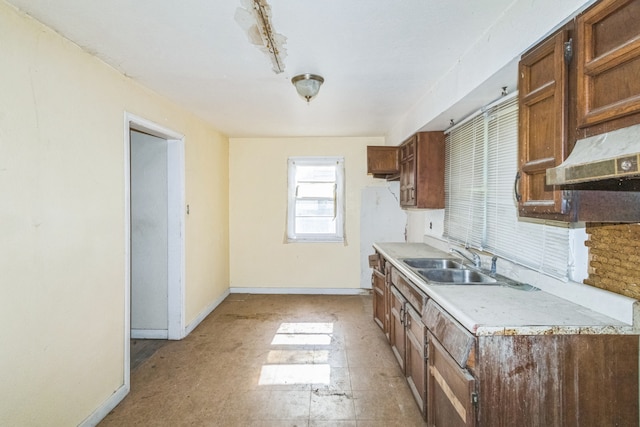 907 W Beardsley Ave, Champaign, IL 61821 - kitchen with light countertops and brown cabinets