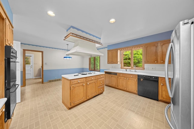 212 Forsythe Ln, Dekalb, IL 60115 - kitchen with black appliances, premium range hood, brick patterned floors, light countertops, and recessed lighting