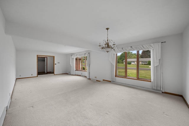 212 Forsythe Ln, Dekalb, IL 60115 - carpeted spare room featuring a chandelier and baseboards