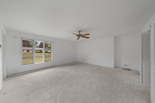 212 Forsythe Ln, Dekalb, IL 60115 - unfurnished room featuring a baseboard radiator, carpet, and a ceiling fan