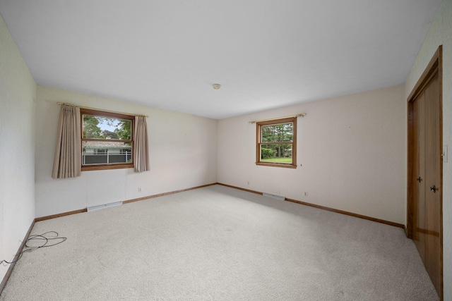 212 Forsythe Ln, Dekalb, IL 60115 - unfurnished bedroom featuring carpet flooring and a closet