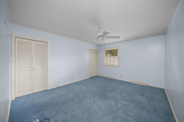 212 Forsythe Ln, Dekalb, IL 60115 - unfurnished bedroom featuring two closets, carpet flooring, and ceiling fan