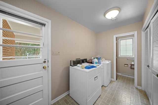 212 Forsythe Ln, Dekalb, IL 60115 - laundry area featuring wallpapered walls, separate washer and dryer, and brick patterned flooring