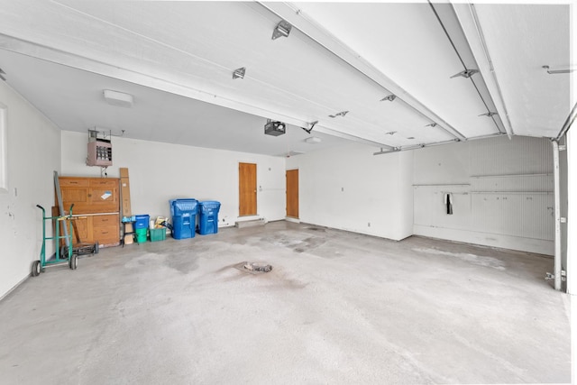 212 Forsythe Ln, Dekalb, IL 60115 - garage with a garage door opener and a heating unit
