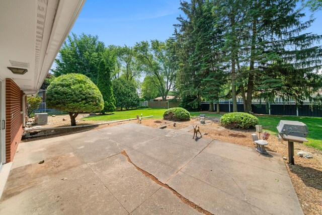 212 Forsythe Ln, Dekalb, IL 60115 - fenced backyard with a patio