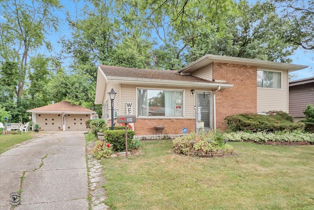 109 Wilson St, Park Forest, IL 60466 - tri-level home featuring brick siding, a front lawn, a detached garage, and an outdoor structure