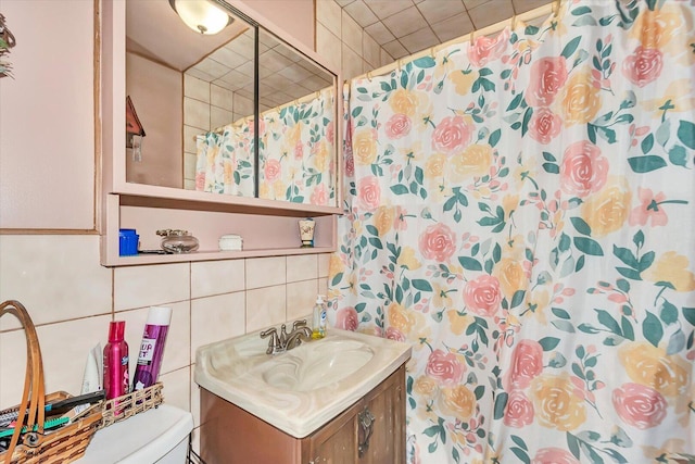 109 Wilson St, Park Forest, IL 60466 - bathroom with vanity, a shower with curtain, and tasteful backsplash
