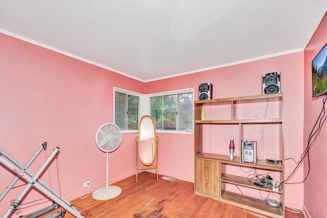 109 Wilson St, Park Forest, IL 60466 - exercise area featuring wood finished floors and crown molding