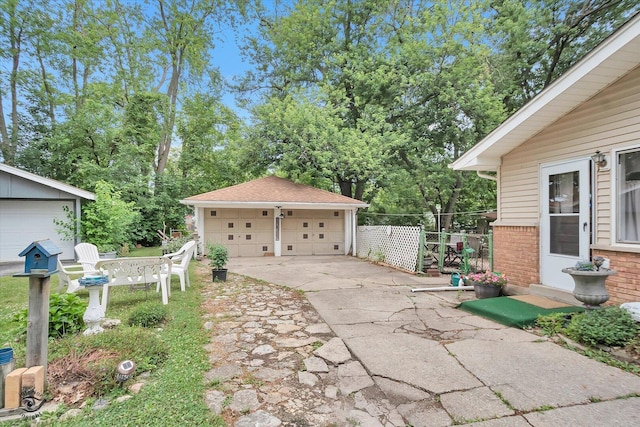 109 Wilson St, Park Forest, IL 60466 - detached garage with view of wooded area