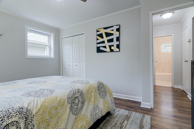 336 Manitowac St, Park Forest, IL 60466 - bedroom featuring dark wood-style flooring, crown molding, a closet, and a ceiling fan