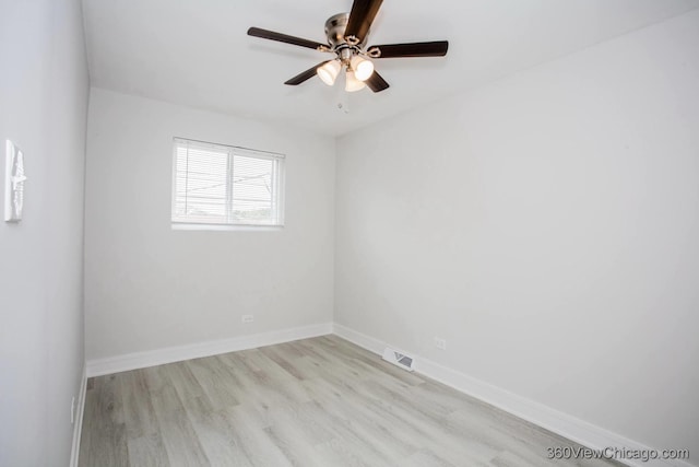 9154 S Luella Ave, Chicago, IL 60617 - empty room with wood finished floors and a ceiling fan