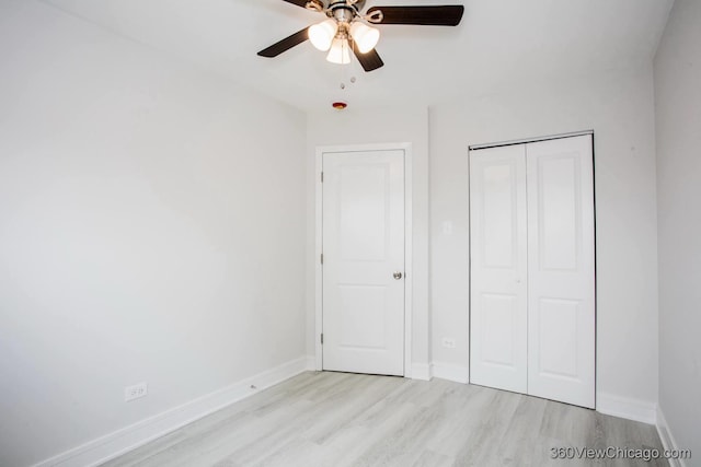 9154 S Luella Ave, Chicago, IL 60617 - unfurnished bedroom featuring light wood-type flooring, a closet, and a ceiling fan