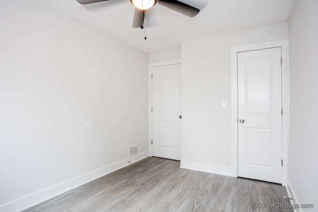 9154 S Luella Ave, Chicago, IL 60617 - unfurnished bedroom featuring light wood-type flooring and ceiling fan