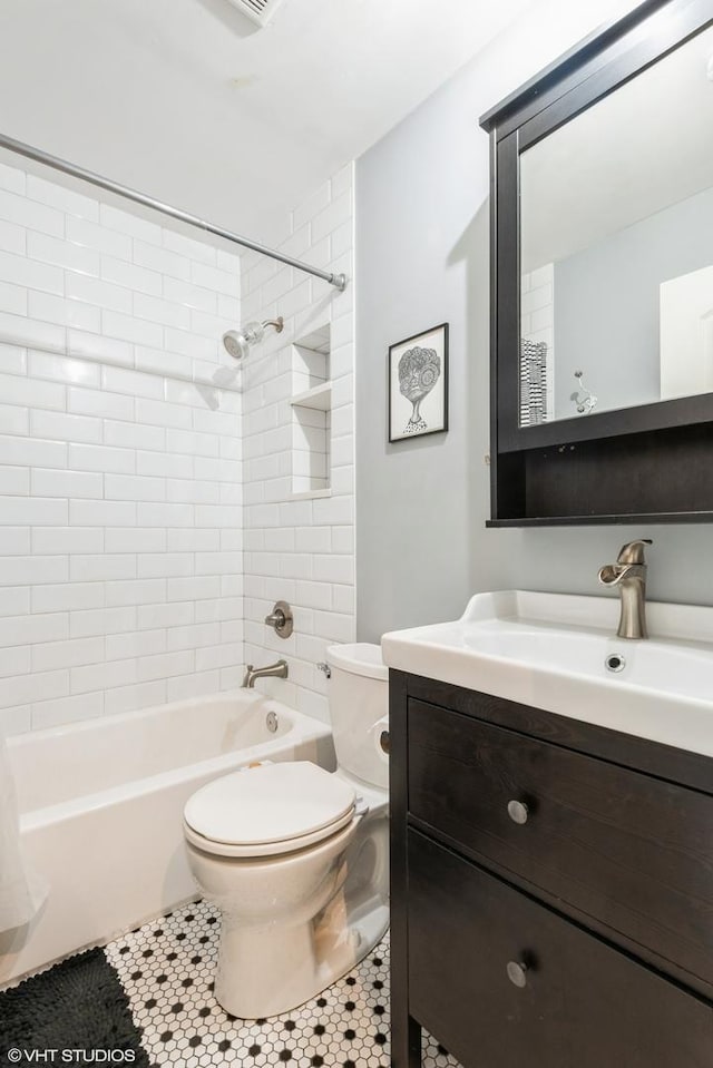 4248 N Keystone Ave Unit 2C, Chicago, IL 60641 - bathroom with vanity, bathtub / shower combination, and tile patterned flooring