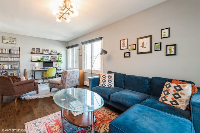 4248 N Keystone Ave Unit 2C, Chicago, IL 60641 - living room with wood finished floors, a chandelier, and baseboard heating